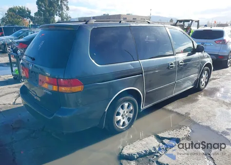 2003 Honda Odyssey Ex-L z USA, uszkodzony, nr VIN 5FNRL18913B026944